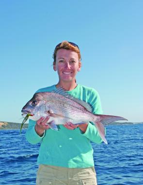 Kim and a baking pan sized snapper caught at Smith’s rock just north of the Cape using a watermelon coloured 5” Gambler.
